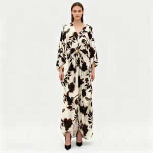 Elegant floral print maxi dress with V-neck and batwing sleeves featuring gold buckle detail