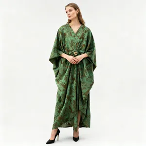 Full-length view of a green printed kaftan dress with elegant V-neck and batwing sleeves
