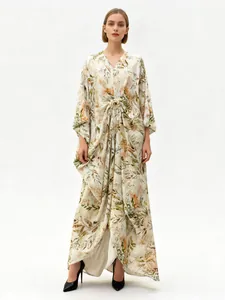Elegant loose floral maxi dress with V-neck, batwing sleeves and metal buckle detail