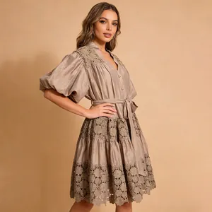 Close-up of French pastoral V-neck puff sleeve short dress with intricate lace detailing