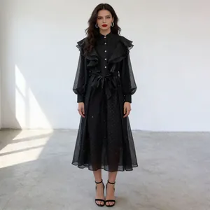 Professional full-length detail of a vintage black ruffle stand collar dress with tie waist