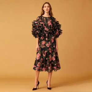 Romantic rose print midi dress with dramatic puff sleeves and ruffled details