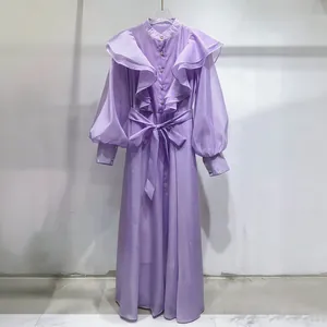 Elegant purple retro palace style maxi dress featuring ruffles, stand collar and waist tie.