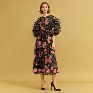 Full view of romantic vintage rose print dress with elegant ruffled puff sleeves
