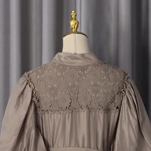 Detailed back view of a French pastoral dress featuring hollow floral lace and puff sleeves
