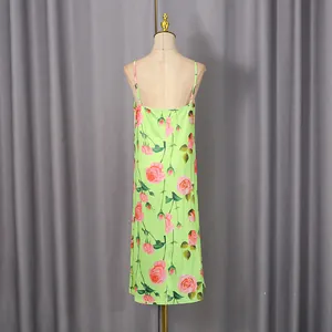Back view of light green camisole dress with vintage pink rose floral print