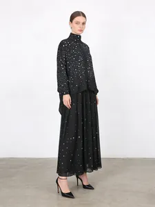 Elegant black rhinestone two-piece set with high neck top and long A-line skirt.