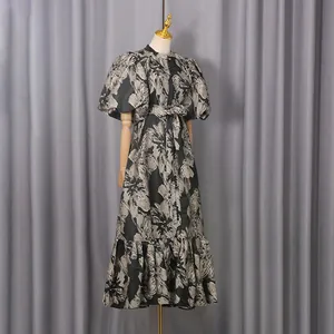 French vintage floral puff sleeve midi dress with tie waist shown on mannequin detail