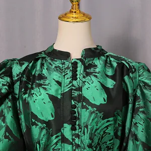 Detail view of French retro floral print dress with puff sleeves and button collar