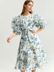 Elegant vintage rose print dress with tiered ruffle puff sleeves and a waist bow tie