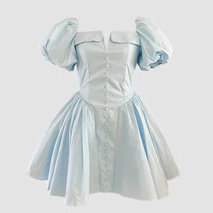 Elegant light blue French style short dress featuring puff sleeves and button-front detail