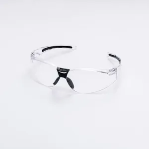 Detailed view of clear safety goggles for industrial protection and outdoor riding