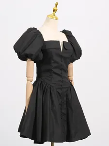 Elegant black French style puff sleeve mini dress with a square neckline and high waist.
