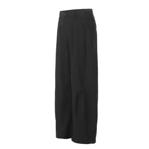Side view of minimalist black curved blade suit pants with 3D pleated design.