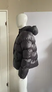 Side view of a men's black leisure hooded puffer jacket on a white display mannequin.