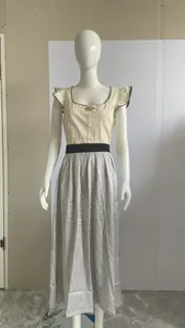 Traditional German Oktoberfest dirndl dress with striped long skirt displayed on mannequin