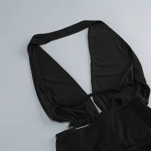 Sexy black halter neck dress with deep V-neck and decorative metal ring detail for women
