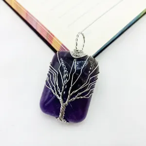Handmade wire-wrapped amethyst tree of life rectangular gemstone pendant detail