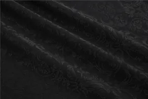 Nahaufnahme der schwarzen Jacquard-Stoffstruktur für traditionelle Trachten zum Oktoberfest