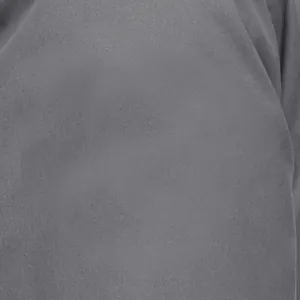 Macro close-up view of the high-quality grey fabric texture on this women's outdoor jacket.