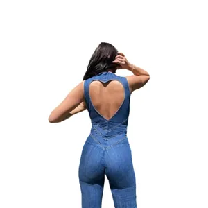Slim fit denim jumpsuit featuring a sleeveless design and heart-shaped cutout back.
