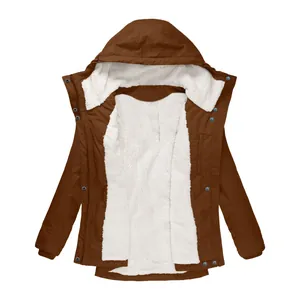 Detailed view of women's brown hooded jacket with soft white fleece interior lining.