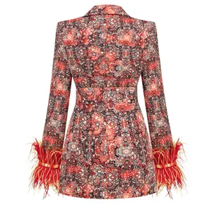 Elegant floral print blazer dress featuring luxurious red feather-trimmed cuffs, back view.