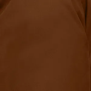 Macro view of detailed brown canvas fabric texture for women's autumn winter jacket