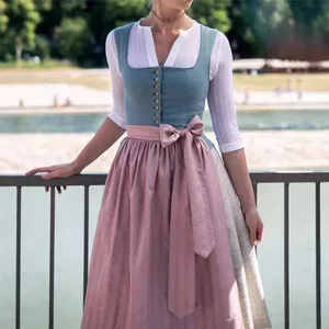 Traditional German Dirndl dress with blue bodice and pink apron for Oktoberfest festivals