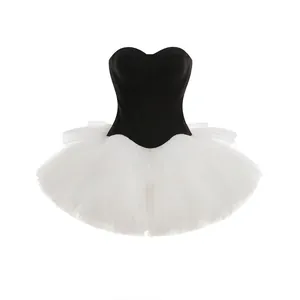 Elegant two-piece set featuring a black corset top and a puffy white tulle tutu skirt.