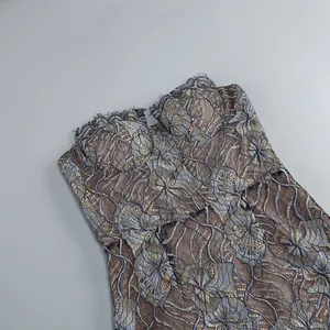 Close-up of intricate floral lace detail on a sexy sweetheart neckline fishtail dress.