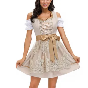 Vista frontale di un elegante abito Dirndl beige con ricami in pizzo e fiocco in raso dorato