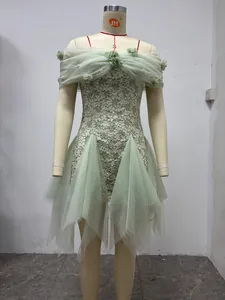 Detailed view of mint green off-the-shoulder lace dress with 3D flowers and tulle