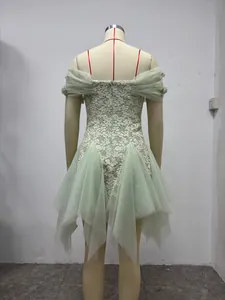 Back view of light green lace dress with off-shoulder mesh and 3D floral details.