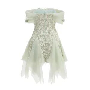 Back view detail of French off-the-shoulder mint lace dress with layered tulle skirt