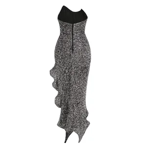 Detailed back view of a sparkling silver sequin midi dress with elegant ruffle hem