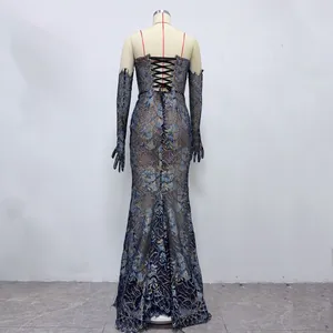 Back view detail of lace fishtail dress with corset-style lace-up back and matching gloves