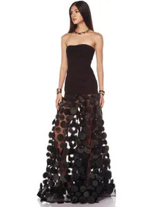 Detailed view of black strapless dress with 3D floral appliqués on sheer mesh skirt