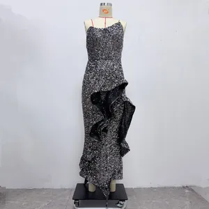 Detailed view of glamorous silver sequined strapless evening dress with ruffles