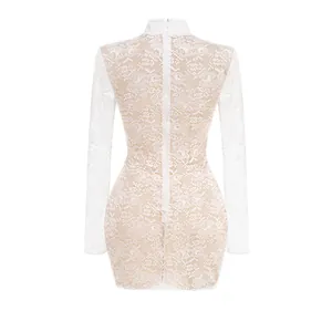 Back view of elegant white lace mini dress with high collar and long sleeves