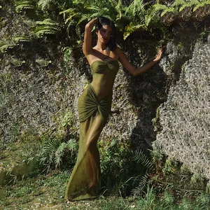 Detail of sexy strapless olive green maxi dress with ruched waist and sheer sparkling fabric