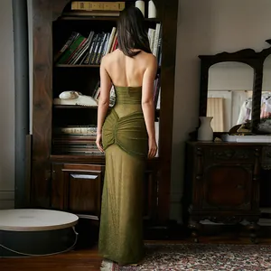 Detail back view of olive green shimmery strapless gown with elegant pleated fabric