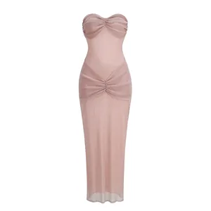 Close-up of pink ruched strapless dress with shimmery fabric detail