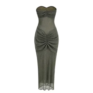 Close-up of a strapless metallic mesh maxi dress with elegant ruched details at the waist.