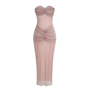 Close-up of elegant pink ruched mesh strapless maxi dress with sweetheart neckline