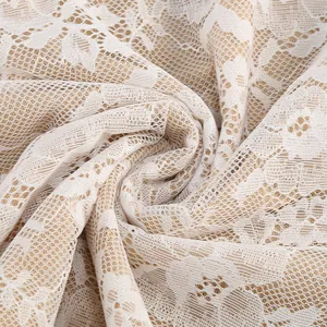 High-quality macro detail view showing intricate floral lace jacquard fabric texture