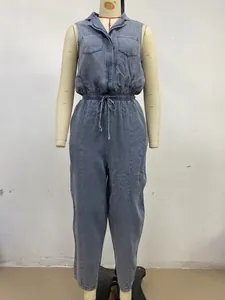 Full front view of a sleeveless casual washed denim jumpsuit on a mannequin display