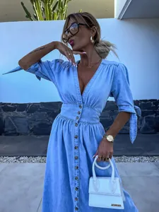 Detailed view of a sexy V-neck light blue denim button-down maxi dress for women