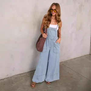Chic women's street style light blue denim wide-leg overalls with large pockets