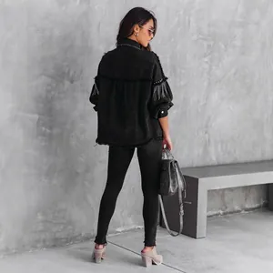 Street fashion black fringe jacket with heavy-duty silver studs and chain details